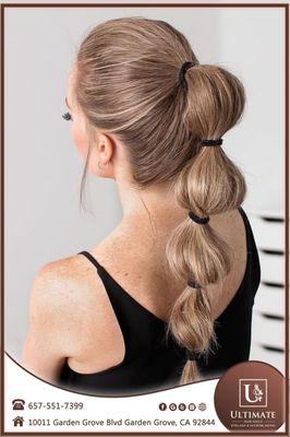 Want a fun and playful in July hairstyle? A bubble ponytail is your answer!