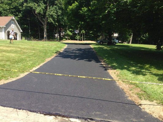 New asphalt driveway- no more pot holes!