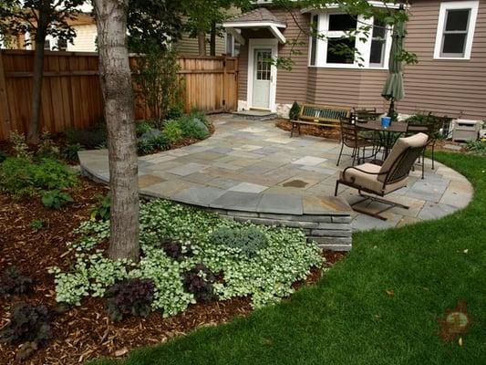 Bluestone patio and plantings for this Minneapolis landscape.  The a very elegant space for the clients to enjoy afternoons.