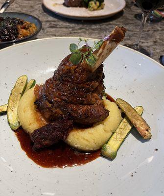 Lamb Shank: Apricot-gazed Lamb on Root Vegetable Mash, Confit Squash, Cranberry-Date Relish