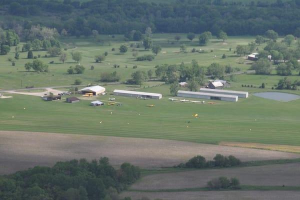 Red Stewart Airfield from the air w/ Cub on takeoff