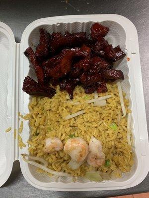 Boneless spare rib with shrimp fried. Not too old and greasy full of barbecue sauce and good taste. Good price with a good portion.