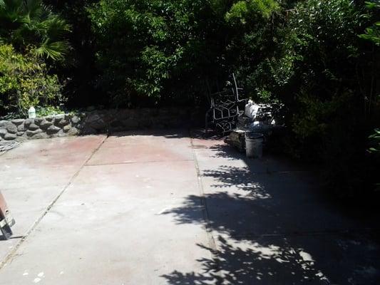 After: A Side Yard Of A Person's House Freed From The Large Pile