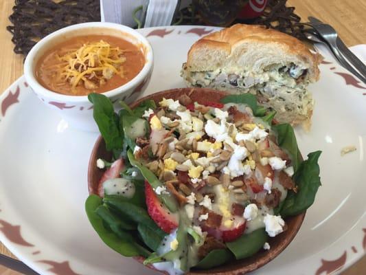 Tomato soup, spinach salad, and chicken salad sandwich