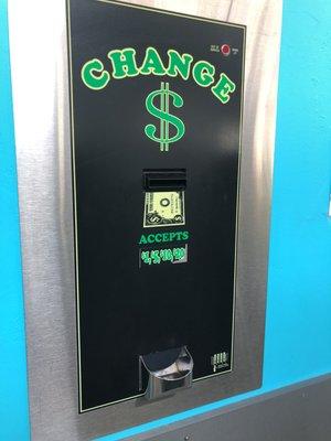 Coin changer on site accepts 1,5,10,& 20 dollar bills.