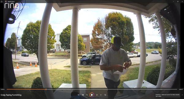 Video Doorbell capturing Cedric Thomas taping a Notice of Furnishing, a threat to put a lien on my house, due to my small claims filing