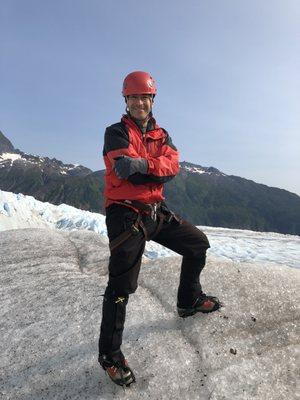 Dr. Wald in Alaska having just landed on a glacier by helicopter.