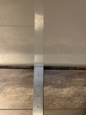 Huge gap between bathtub and flooring