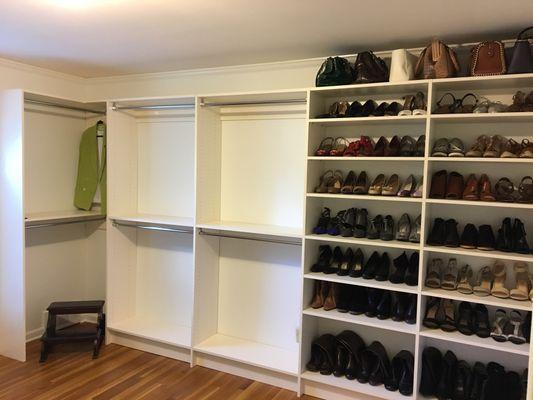 Converted spare bedroom to a dressing room with visible shoe display and storage Along with tons of additional hanging space.