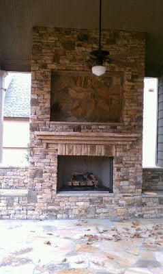 Outside fireplace we built from scratch, patio too.