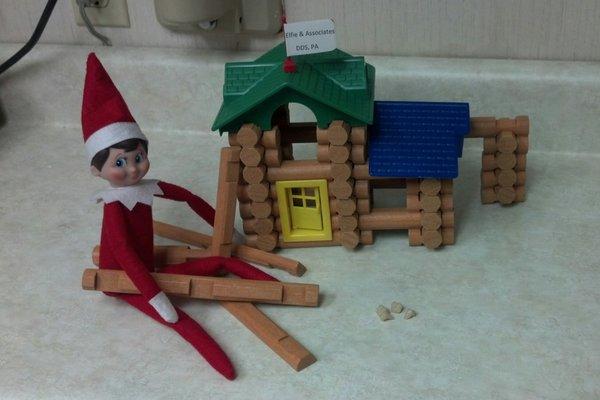 Our young patients look to see what adventures Elfie gets into each year.  In 2015, Elfie built himself a Lincoln Log Dental Practice.