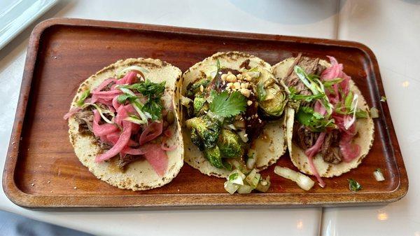 2 barbacoa tacos and a brussel sprout taco.