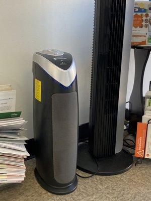 GermGuardian Air Purifier with HEPA & UVC in the clinic's waiting area, on during clinic hours..