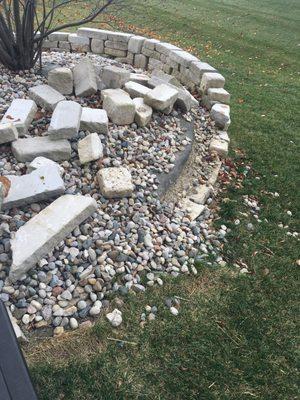 Our rock wall done by Blade Cutters! Was not in the five year plan to have to have this rebuilt since they self admittedly built it wrong.