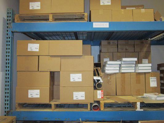 Boxes on pallets on pallet racking.