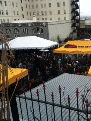 Another view of the zoo of people in a cluster just to get a taste of stout.