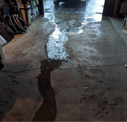 River running through garage every time it rains.