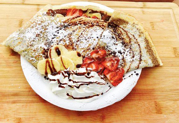 Yummy sweet crepes- dark chocolate or Nutella with fresh strawberry and bananas :)