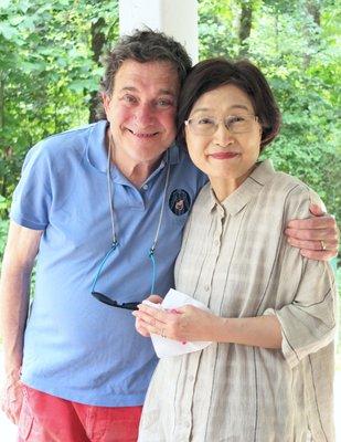 GANV Founder, and Clinical researcher, Dr. Kenneth Mirkin hugs long time colleague Business Mgr. & friend, Jin, at the 2019 Picnic