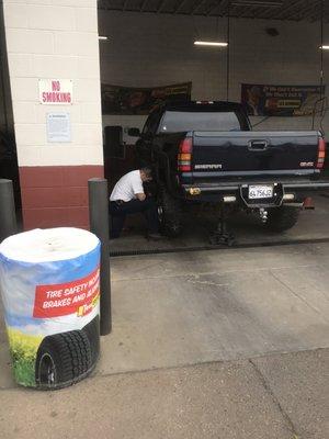 Tim changing my tire