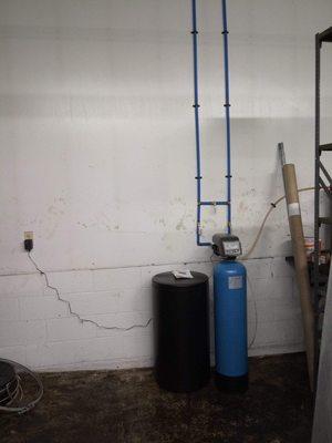 Water softener system installed with PEX pipe