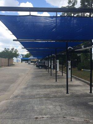 Some of the blue mesh tarps at our car wash location.