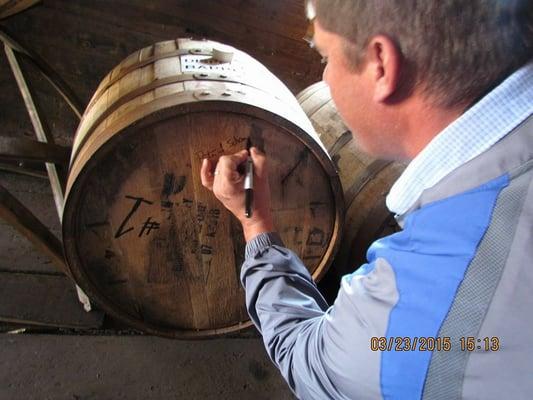 Peter Signing the Barrel Head of the hand Selected Barrel of 1792 exclusive for Judy's Liquor and JP Liquor