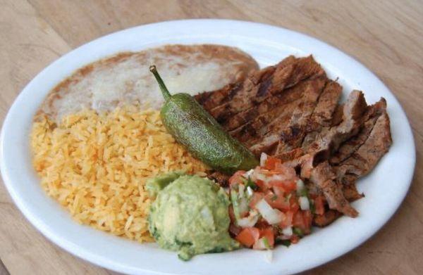 Carne asada (grilled steak) rice and beans