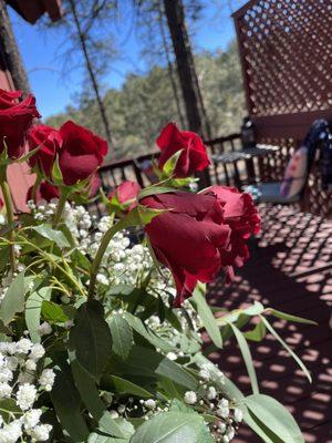 Notice the drooping rose buds- from lack of water & poor quality- as I got them off my porch at delivery.