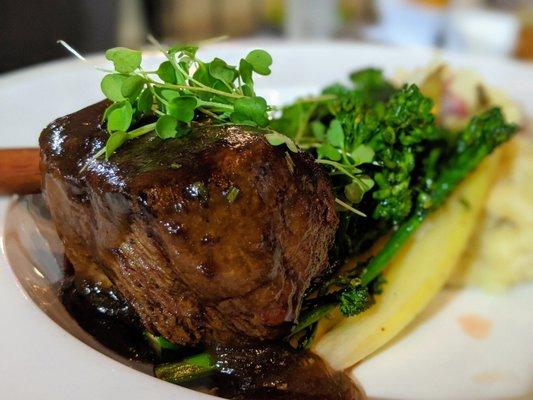 The Champ. Grass-fed grilled filet mignon, mashed potatoes, broccolini, baby carrots, bourbon-infused demi-glace. $24. Good deal.