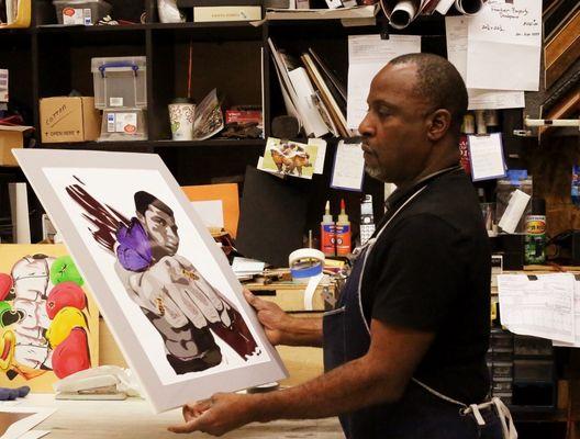 Framing expert designs a limited edition lithograph of Muhammad Ali