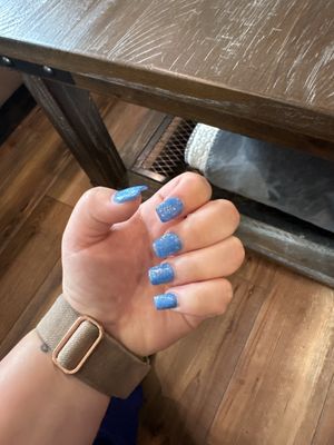 Short blue sparkling nails