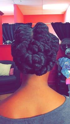 4 goddess braids up in a bun