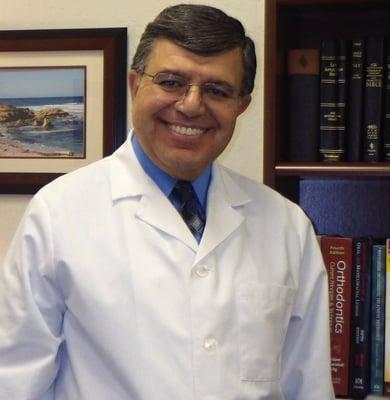 Dr. Moody W. Malek, D.D.S., F.A.G.D. (A general dentist who is a "Fellow" in the Academy of General Dentistry.