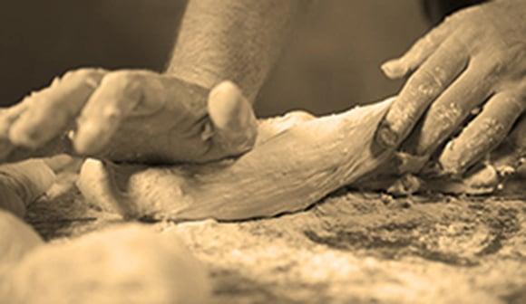 The hands of an Artisan Bread maker