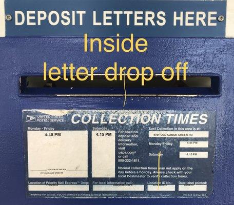 Inside building, letter drop off slot pickup times.