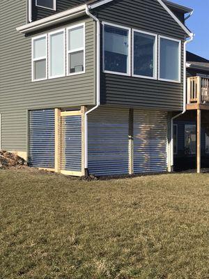 Roomy sheds under sunrooms!