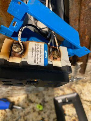 Take a look at this burned outlet we found. 
Give us a call at 571-239-2992, if you ever smell an electrical burning smell in your home.