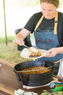 Chef April Bloomfield preps a dish at the FarmOn! Foundation's 2014 Friend of the Farmer festival.