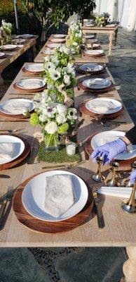 Place-settings arranged by the Host Pros servers for a private home backyard party