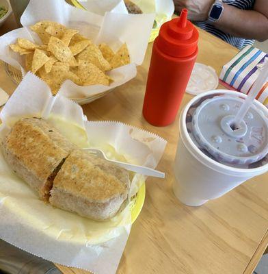 Burrito al Paster, Hibiscus Agua Fresca, tortilla chips, hot sauce.