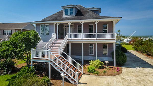 Fantastic Waterfront Home at 105 Maxwell Drive, Harkers Island, NC 28531 with DEEP Water Boat Slip & Lift.