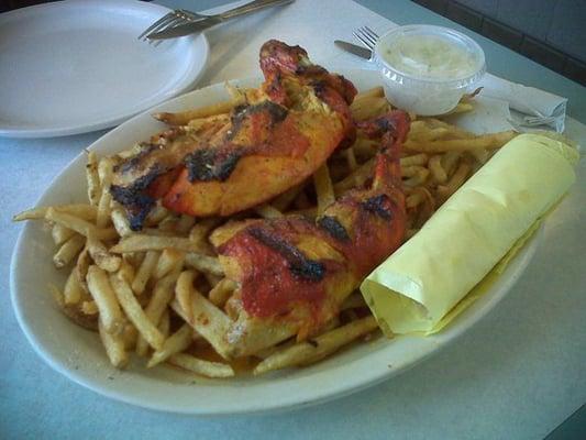 Fiery half chicken topped on a layer of fries. Served w/ tortillas and coleslaw. YUM!