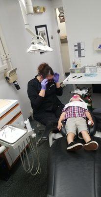 Pediatric dental treatment with nitrous oxide sedation