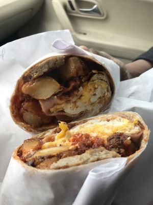 Hungry Man - Bacon, Ham, Sausage, Egg, Home Fries and Cheese ($7)