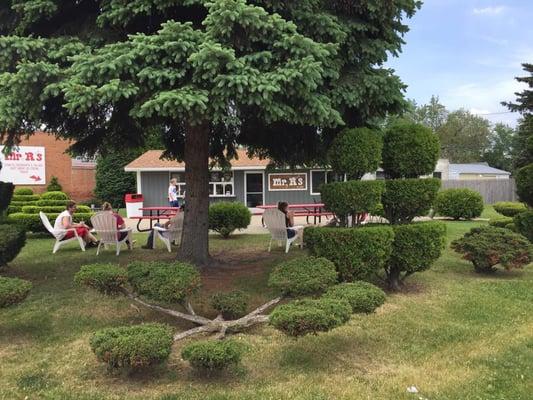 Outdoor seating in the natural shade! 'R' topiaries are carved by Mrs.R herself!