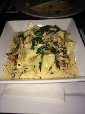 Homemade pasta with local spinach, exotic mushrooms, fresh lobster in a light cognac cream sauce...just amazing!!