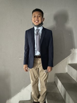 Blue suit jacket  and tie