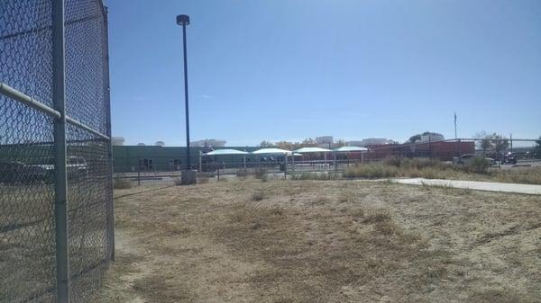 View of the school from the Visitor Parking / behind the baseball cage.