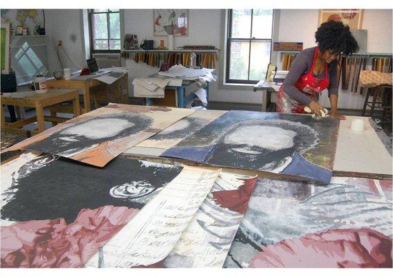 Artist-in-Residence, Tyanna Buie, working on large scale prints in WSW's silkscreen studio.